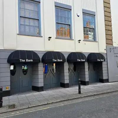 4 black awnings above double doors