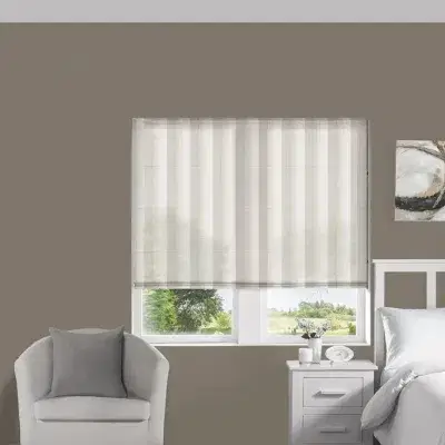 white roman blinds on a bedroom window