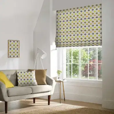 Yellow patterned roman blinds