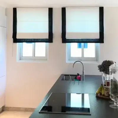 White and back roman blinds