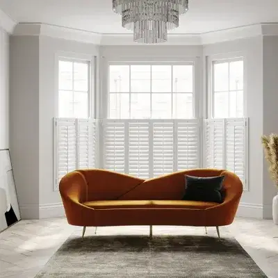White shutters on a bay window